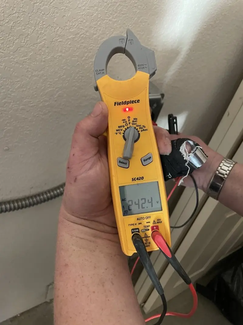 Voltage testing with clamp meter during Circuit Breaker Repair in Pine Level